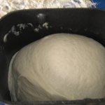 Ready dough in a bread machine container