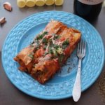 Cannelloni with minced meat and bechamel sauce, cream, cheese. Recipe 