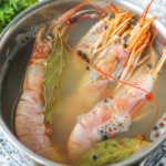 Langoustines are cooked in a pan