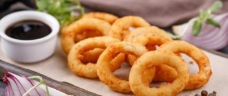 Fried onions in a frying pan. Homemade recipe 