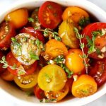 Lightly salted tomatoes. Classic recipe with garlic, herbs, vinegar, in a bag 