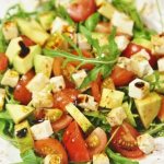 Avocado salad with tomatoes and cheese