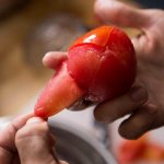 Removing the skin from a tomato
