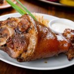 Pork knuckle with onion and garlic