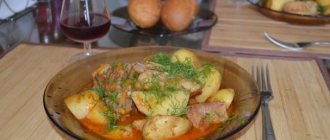 Pork ribs with potatoes in a cauldron