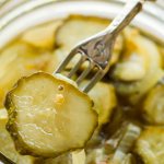 stewed potatoes with pickles and meat