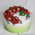 decorate the cake with fruits and berries